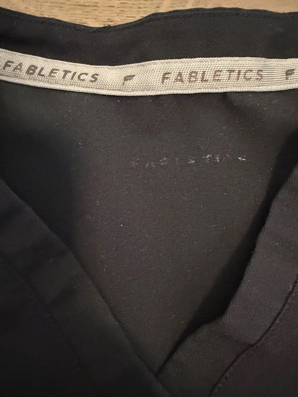 Fabletics Vital Scrub Top in Black - Picture 6 of 7